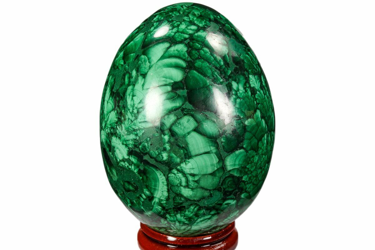 A polished Malachite stone egg