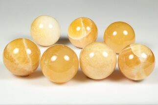 Polished, Orange Calcite Spheres #194314