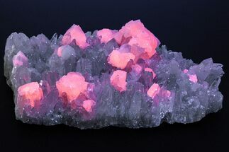 Fluorescent Calcite Crystals on Clear Quartz - Peru #213585